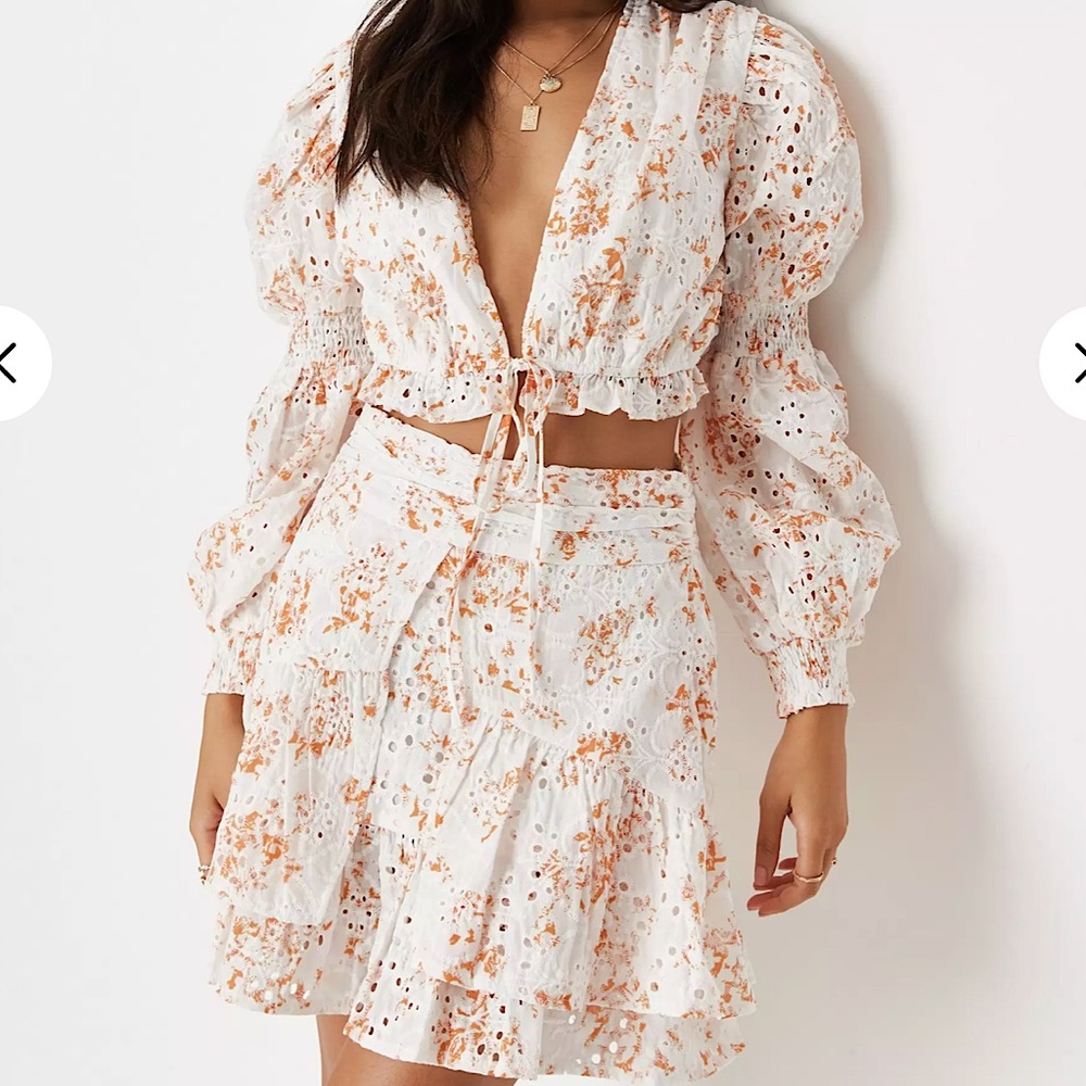 Orange and white broderie set.